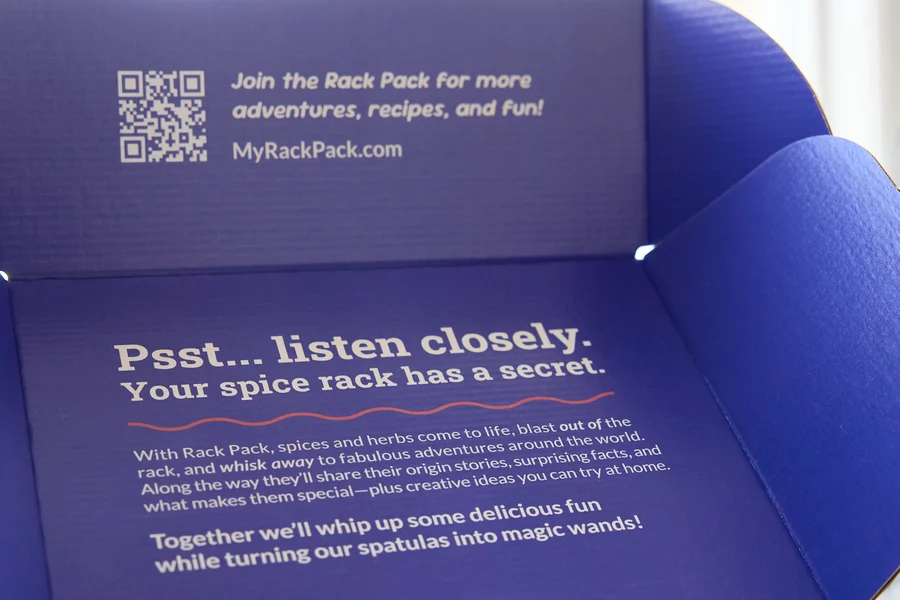 The box lid's hidden message, one of the four printed inserts